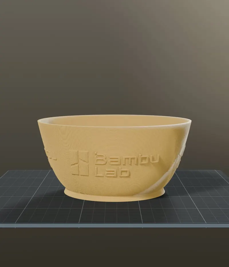 Wide bowl with embossed wall text, rendered on a print bed