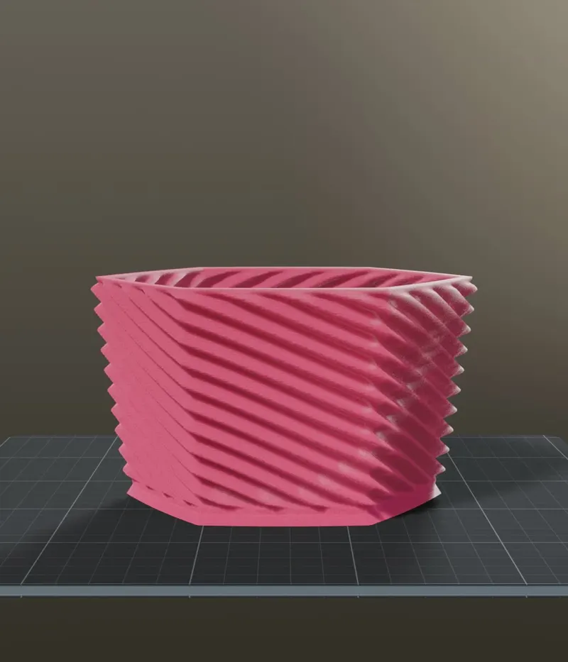 Tapered planter with twisted ribs, rendered on a print bed